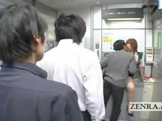 Bizarre Japanese post office offers busty oral sex video ATM
